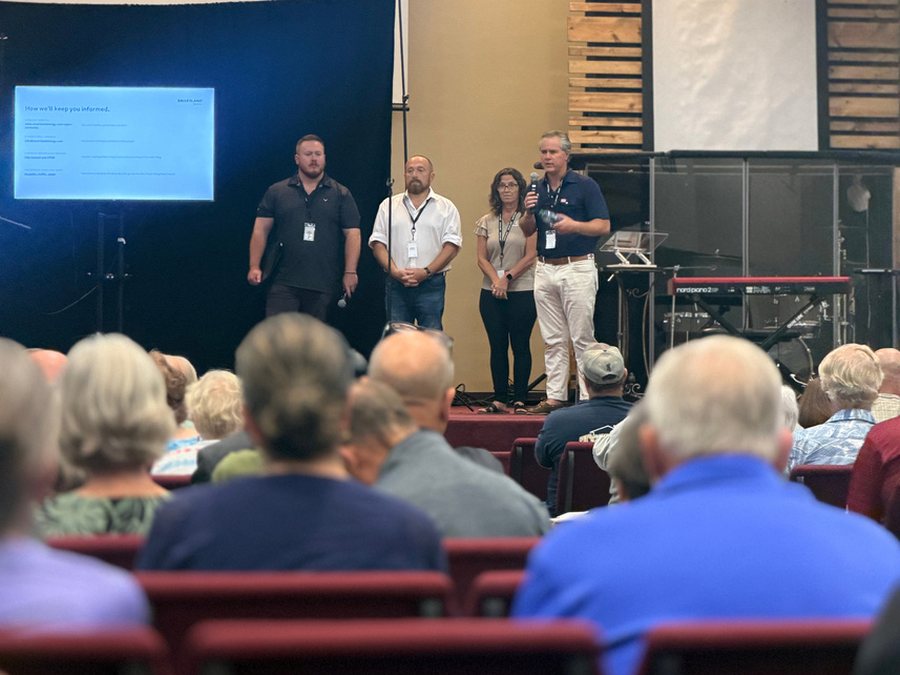The Smartland Energy team on stage facing residents